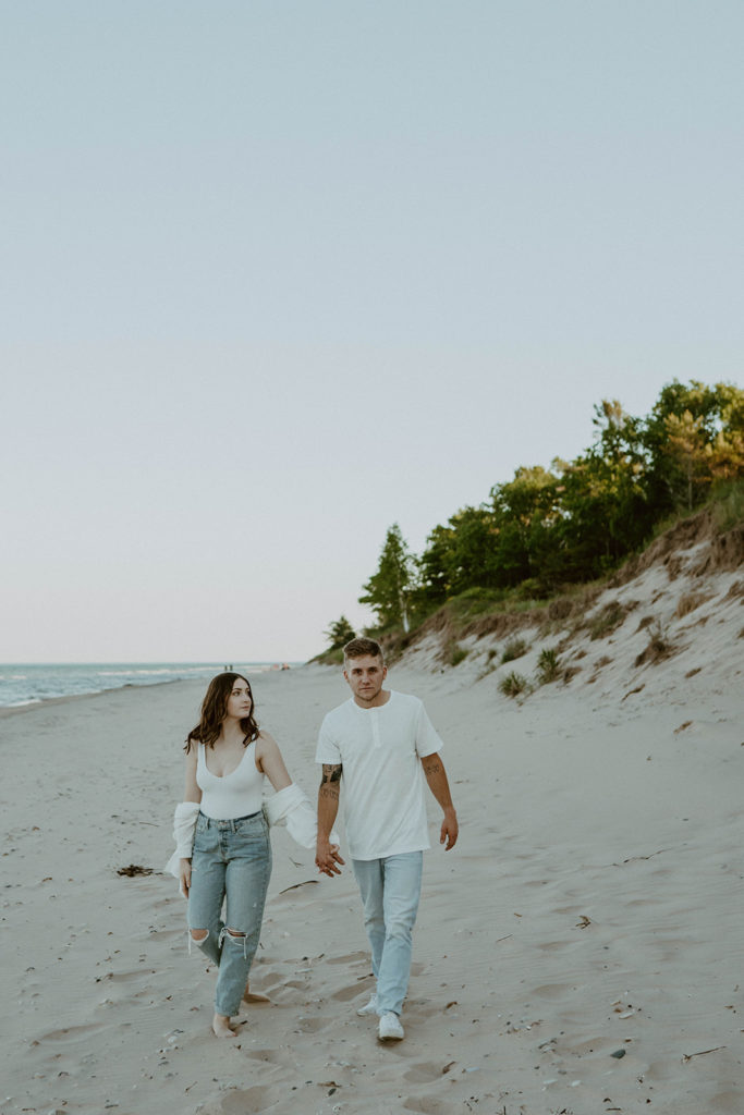 couple strolling on beach