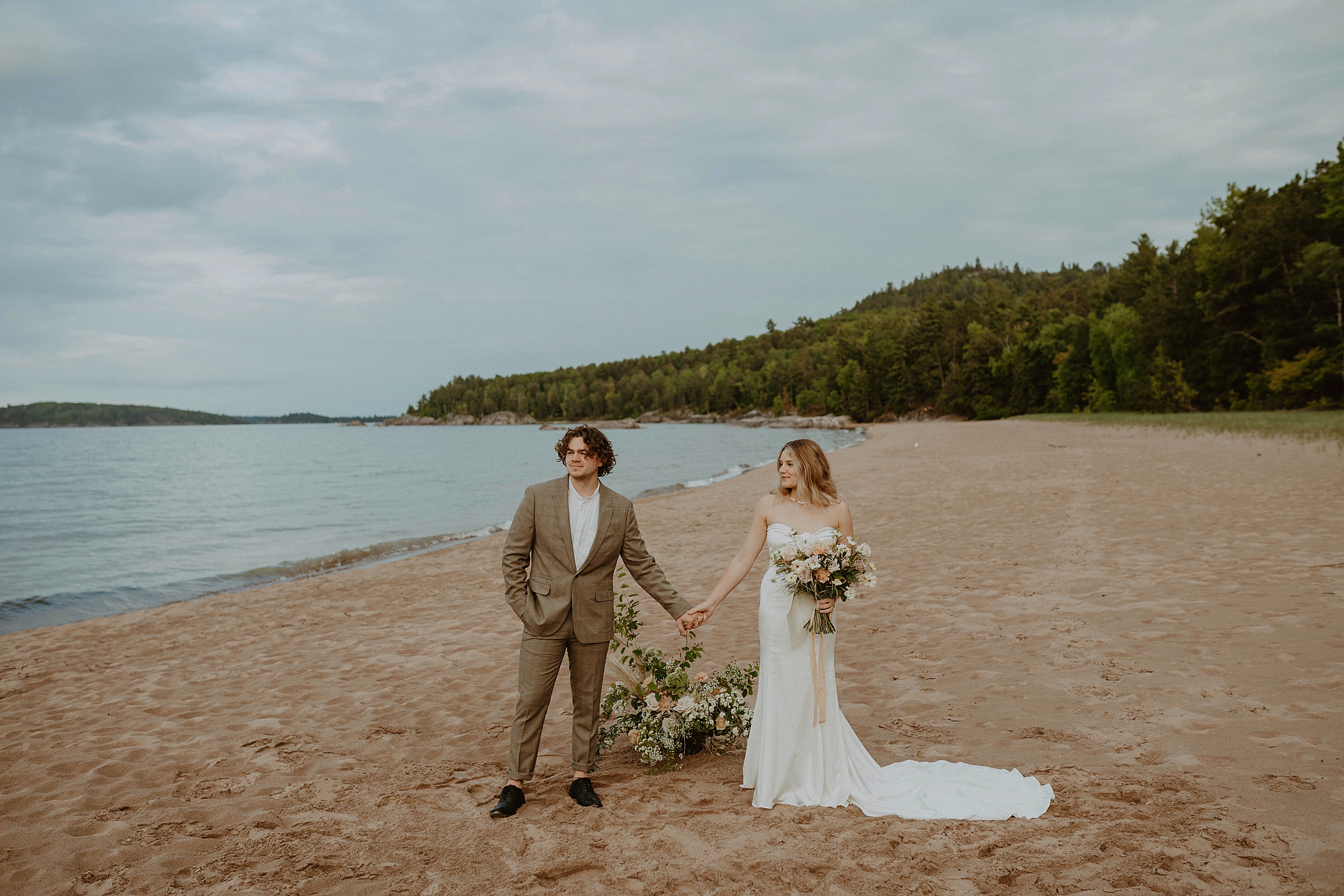 couple standing on beach